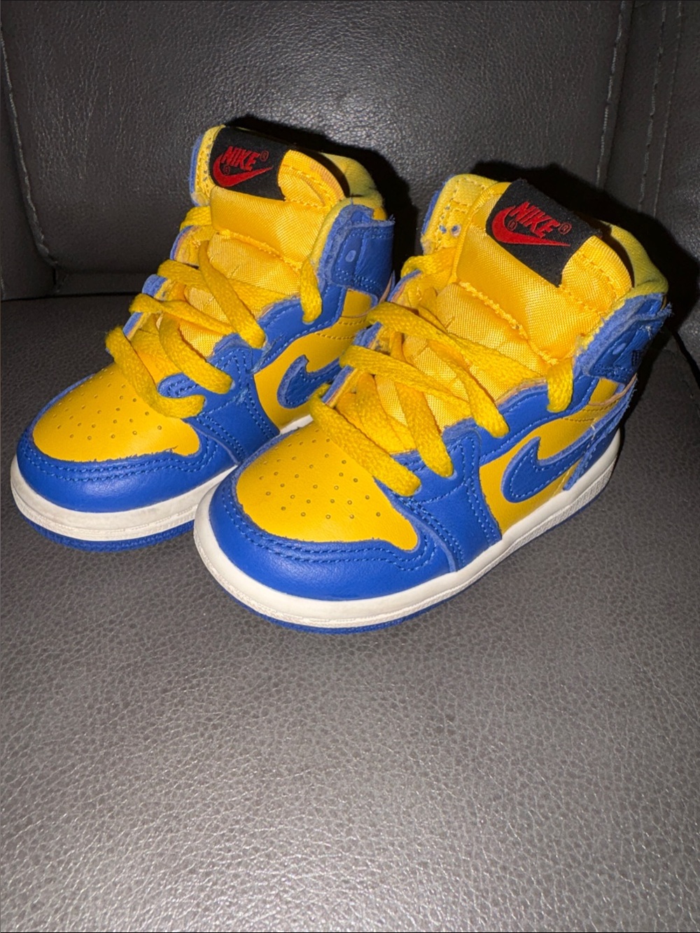 Nike Air Jordan kids (toddler) High-Top Sneakers in Blue and Yellow